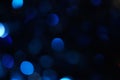 Blue bokeh circles close-up. Festive background