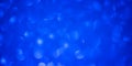 Blue Bokeh round shape Mother`s day Background with Bright blue glitter Lights for Valentine`s Day, 8 march or Women day.