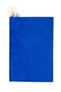Hardcover book covered with blue velvet on a white background Royalty Free Stock Photo