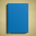 Blue book cover 3D vector mockup. A closed paperback book lying on a wooden table surface