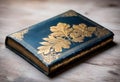 a blue book with gold leaves on the cover Royalty Free Stock Photo