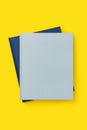 Blue books on yellow background, mockup Royalty Free Stock Photo