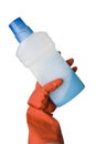 Blue bottle and a female hand in red kitchen glove
