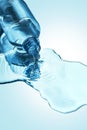 Blue bottle of water leaking Royalty Free Stock Photo