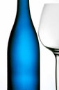 Blue bottle & wine glass Royalty Free Stock Photo
