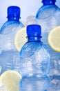 Blue bottles of water in ice Royalty Free Stock Photo