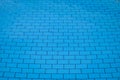 blue bottom of the pool. Pool water top view, rectangular pool tile