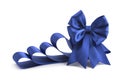 Blue bow on a blue ribbon on a white background Royalty Free Stock Photo