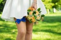 Blue bow tie a bandage on the foot of the bride you knee Royalty Free Stock Photo