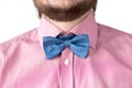 Blue bow-tie with pink shirt.