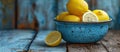 Blue Bowl With Lemons on Wooden Table Royalty Free Stock Photo