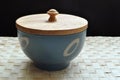 Blue bowl with wooden cover