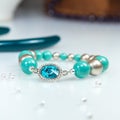 Blue bracelet with blue crystal stone Royalty Free Stock Photo