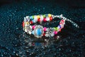Blue bracelet with drops of water Royalty Free Stock Photo
