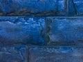 Blue brick wall. Large smooth brick. Blue cold background with horizontal brickwork.