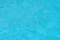 Blue and bright ripple water and surface in swimming pool Royalty Free Stock Photo