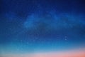 Blue bright starry sky  pink sunset moon light milke way universe nebula  cosmic background Royalty Free Stock Photo