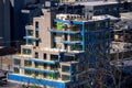 Blue and brown multi-story residential building in Pittsburgh, Pennsylvania, USA.