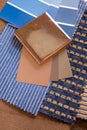 Blue and brown swatches with a ceramic tile Royalty Free Stock Photo