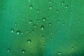 Blue brushed metal surface with water drops Royalty Free Stock Photo