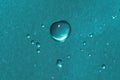 Blue brushed metal surface with water drops Royalty Free Stock Photo