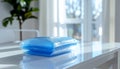 Blue Bubble Wrap Packaged in Transparent Bag on White Table in Bright Room Royalty Free Stock Photo