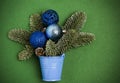 Blue bucket with a Christmas tree and Christmas toys. Preparing for the new year Royalty Free Stock Photo