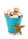 Blue bucket with seashells Royalty Free Stock Photo