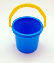 Blue bucket toy with yellow handle isolated on transparent background. Baby and kid activity for the beach. PNG Royalty Free Stock Photo