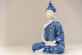 Blue buddha image on white background