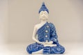 Blue buddha image on white background