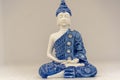 Blue buddha image on white background