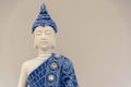 Blue buddha image on white background