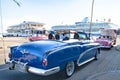 Blue Buick, pink Chevrolet, american classic convertible cars, in front of Cruise Terminal in Havana, Cuba