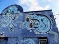 Blue building with fantasy art