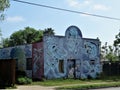 Blue building with fantasy art