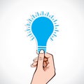 Blue bulb on hand Royalty Free Stock Photo