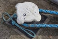 Bundle of rope on the ship mooring bollard Royalty Free Stock Photo