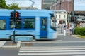 Blue bus on a movement in the Oslo city street, Norway. Royalty Free Stock Photo