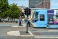 Blue bus on a movement in the Oslo city street, Norway. Royalty Free Stock Photo