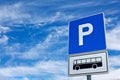 Blue bus parking sign against blue sky Royalty Free Stock Photo