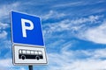 Blue bus parking sign against blue sky Royalty Free Stock Photo