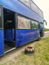 blue bus on the track wheel repair Royalty Free Stock Photo