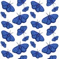 Blue butterfly pattern made of a beaded handmade brooch on white, summer background, fabric or wrapping design