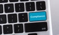 Blue button with text Compliance on keyboard Royalty Free Stock Photo