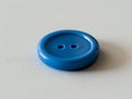 blue button on a textured surface Royalty Free Stock Photo