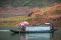 Blue cabin fishing boat on Daning River, Wuchan, China
