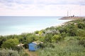 Blue cabin at seashore