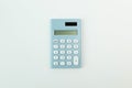 Blue calculator white background image close up. Royalty Free Stock Photo