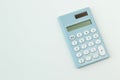 Blue calculator white background image close up. Royalty Free Stock Photo